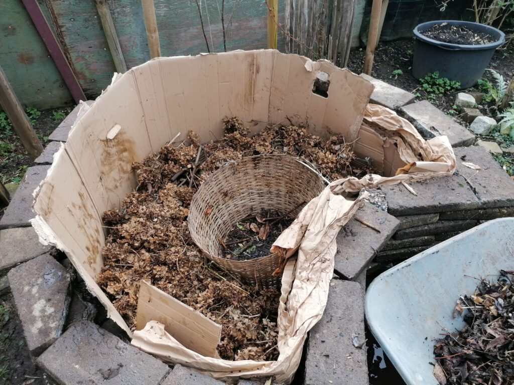 more garden materials used to fill up the keyhole garden 